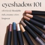 Single Champagne Shimmer crème-to-powder eyeshadow stick with a built-in smudger, showcasing its shimmery finish.