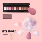 Four pink makeup sponges in various shapes, with a drying holder and a protective egg-shaped storage case