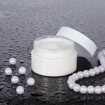 Set of six clear 3 oz plastic jars with white screw-on lids for storage and organization