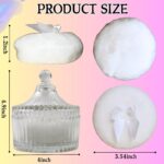 Two white velour body powder puffs with bows inside a clear crystal glass container on a white background