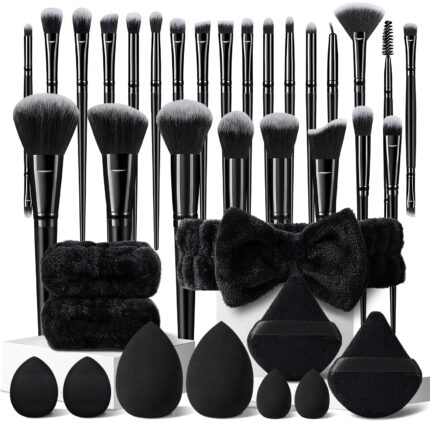 36-piece black makeup brush set with synthetic bristles and ergonomic handles for professional application.