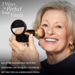 Retractable black kabuki airbrush foundation brush with dense nylon bristles and an aluminum handle