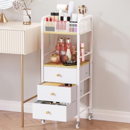 White and natural wood rolling makeup cart with three fabric drawers and top compartments for beauty storage